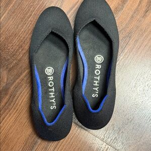 Rothy's Elegant Black Flats with Blue Trim